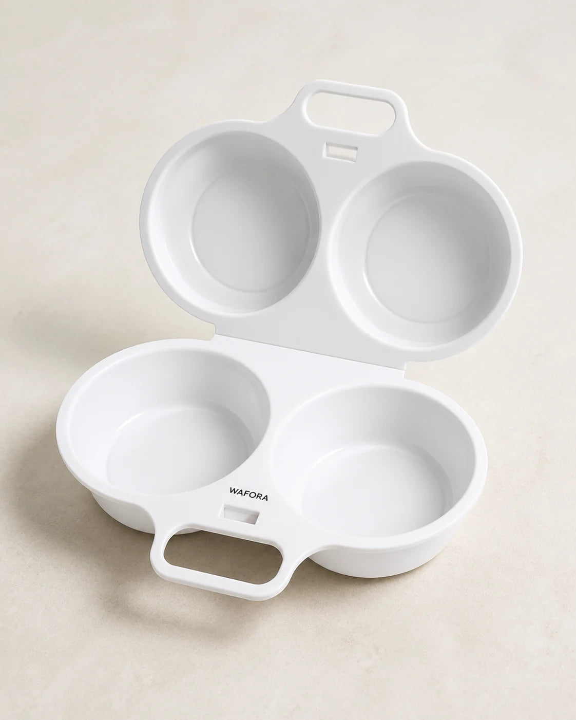 Open white WAFORA PoachLift Duo microwave egg cooker with two round egg cups