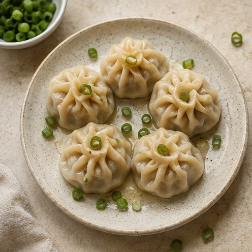 Finished homemade dumplings made from round dough wrappers