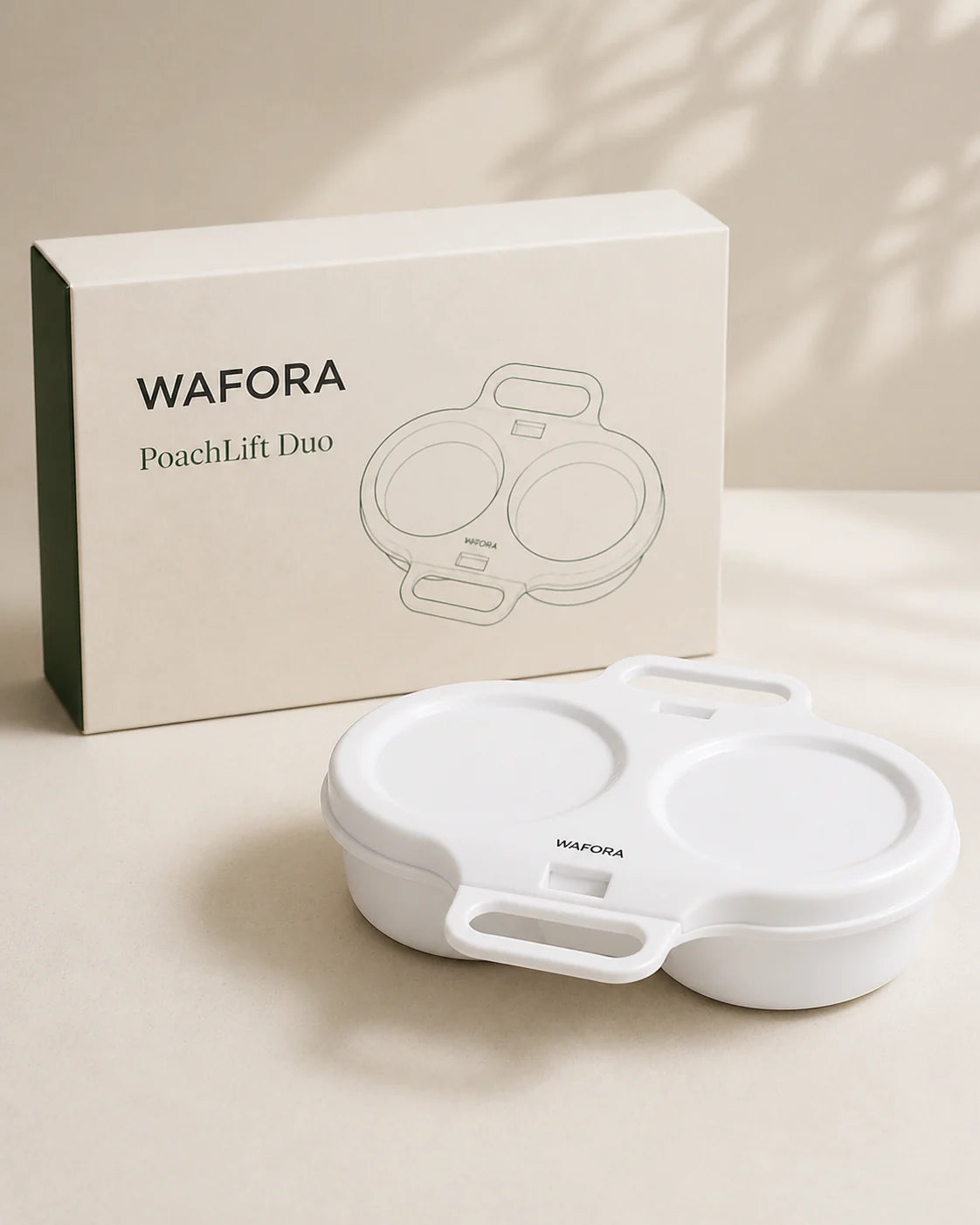 White WAFORA PoachLift Duo microwave egg cooker displayed with WAFORA branded packaging