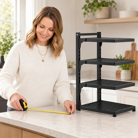 Emma Carter measuring available counter space beside the empty WAFORA PanRise organizer.